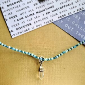 Bead and crystal necklace in blue tones